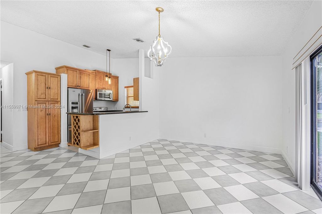 Photo of 3668 NW 83rd Ln #3668, Sunrise, FL 33351 (MLS # A11559971)