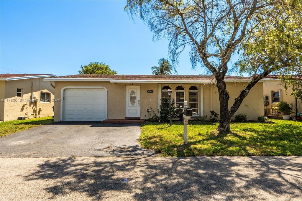 Photo of 4900 NW 13th Ter, Deerfield Beach, FL 33064 (MLS # A11783046)