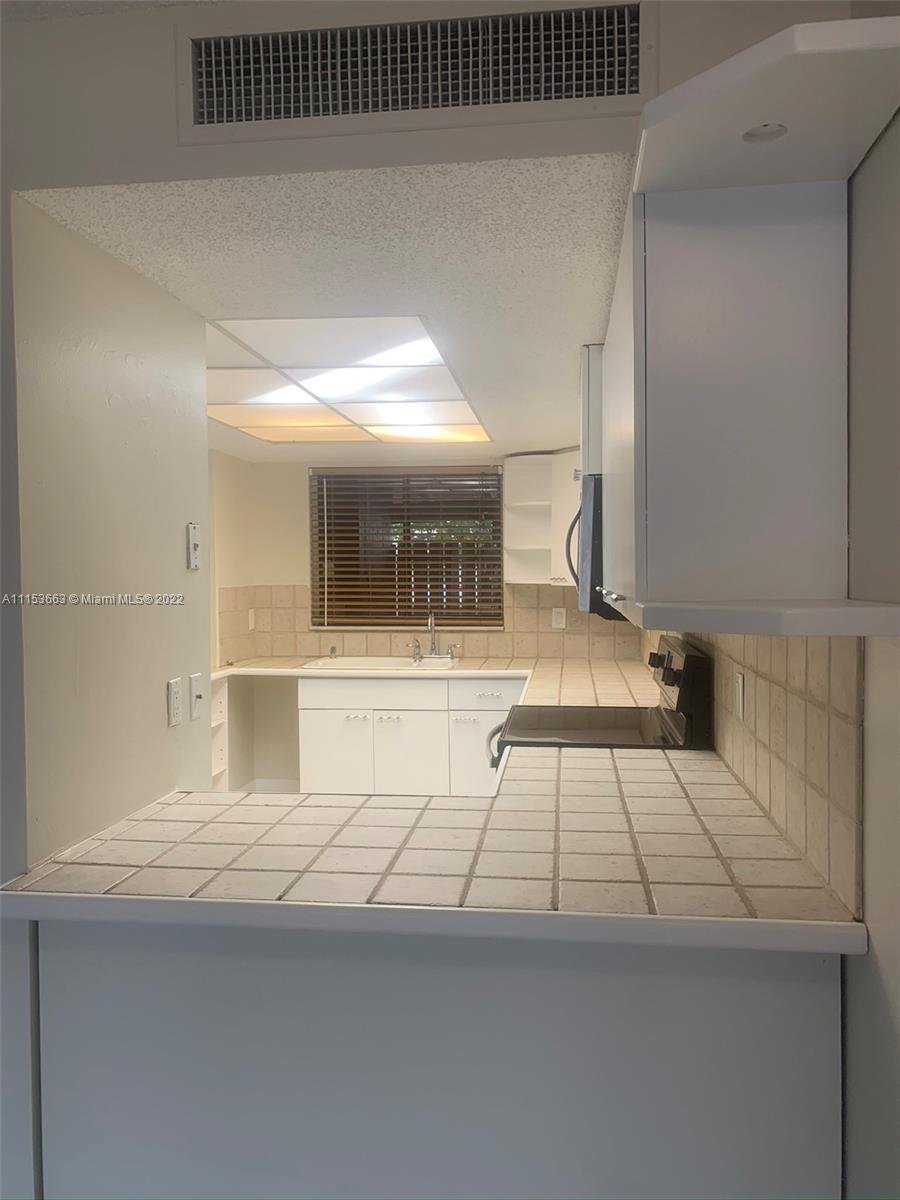 PARKWAY GROVE CONDO PART - Residential