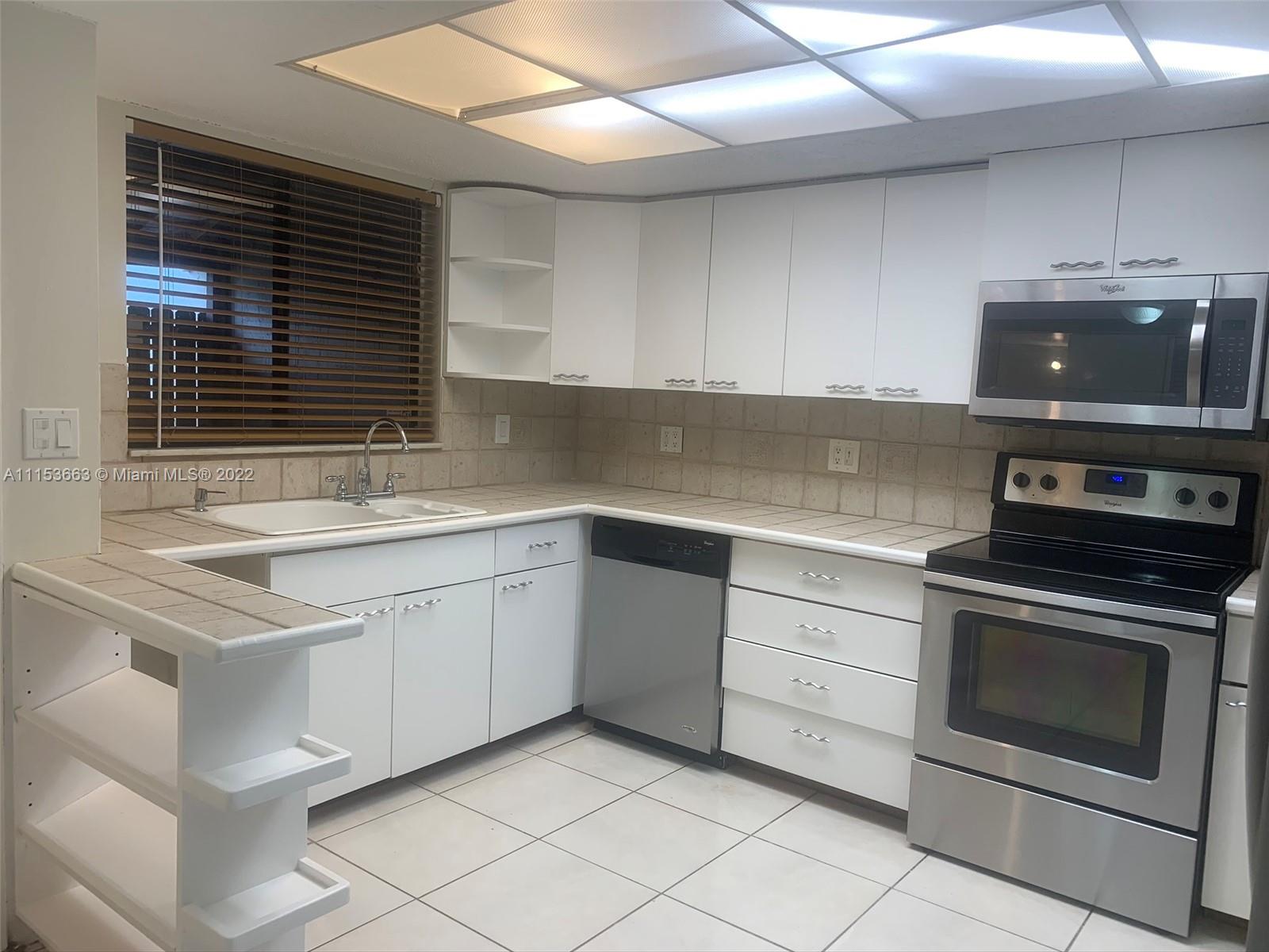 PARKWAY GROVE CONDO PART - Residential