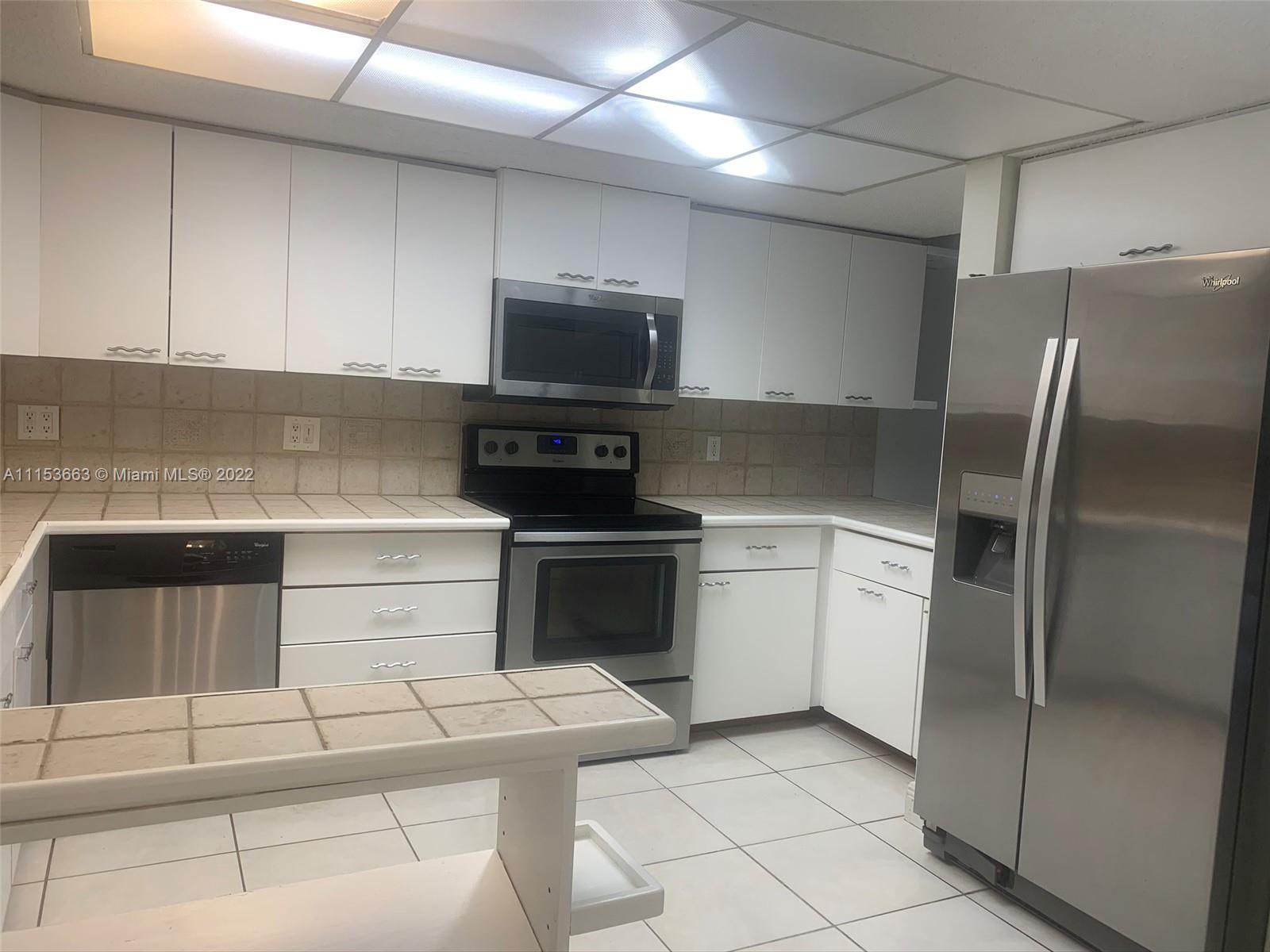 PARKWAY GROVE CONDO PART - Residential