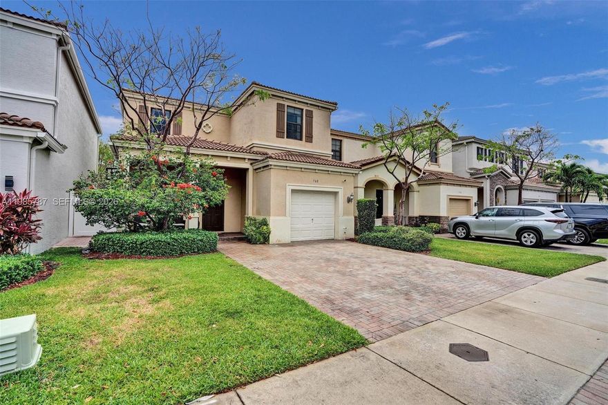 Live with peace of mind in a suburban neighborhood featuring lush landscaping and 24-hour security patrol. Spacious living and dining areas. Modern kitchen with breakfast area, stainless steel appliances, and a granite island with built-in sink. Cozy media room with flat-screen TV, soundbar, comfortable sofa, and abundant natural light. Private outdoor patio with barbecue area. New wall-to-wall carpet on the staircase and in all bedrooms. Ceiling fans ready for Google Home integration. The primary bedroom features a king-size bed. Primary bathroom with dual sinks and ample cabinetry. All bedrooms offer large closets and natural light. Community amenities include a swimming pool, tennis courts, and a covered playground.