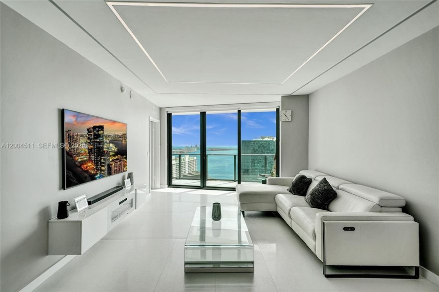 This fully renovated 1-bed, 2-bath + den offers one of the largest 1-bed floor plans in the building. Facing east, it
boasts stunning water & city views, while the spacious balcony is perfect for relaxing or entertaining. Features
brand-new appliances (never used), new countertops, custom lighting & high-end finishes. The den is built out as
an office with a Murphy bed for a guest room option. Custom closets, window treatments & porcelain wood-look
floors complete the space. Enjoy 5-star amenities: a rooftop pool, full-service spa, gym, two pools & top
restaurants downstairs. Prime Brickell location near dining, shopping & nightlife. Schedule your showing today!