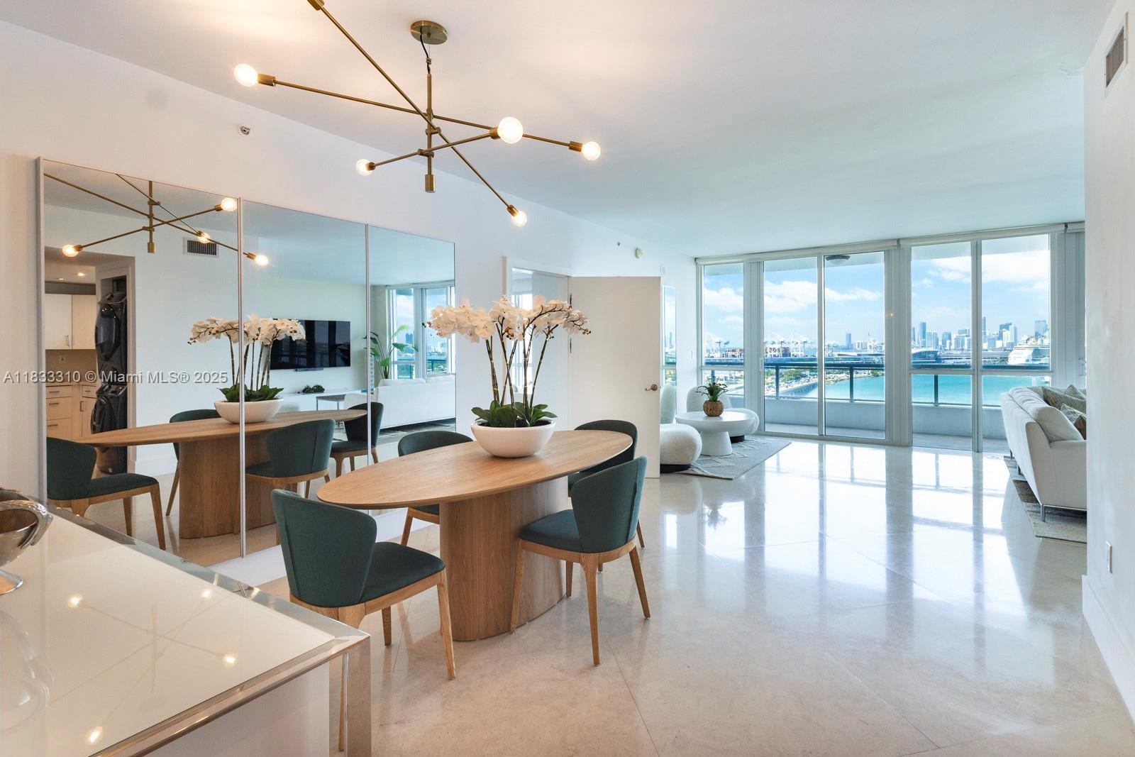 This is a unique furnished 2 bedroom with den condo at the Bentley Bay South Tower. The unit has beautiful direct views of Biscayne Bay. It has floor to ceiling windows throughout, so you can enjoy the beautiful water views from multiple rooms. The Bentley Bay is close to grocery stores, dining, and the South Beach neighborhoods. There is a beautiful pool, gym with updated equipment, front desk attendants, and valet services.
