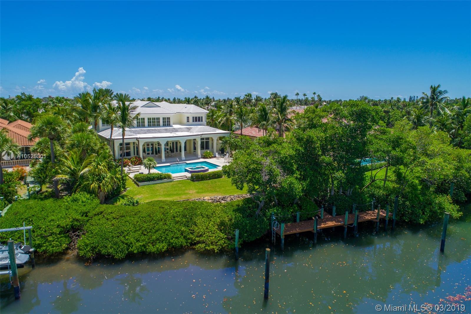 Spectacular WATERFRONT CUSTOM HOME in one of the most premier communities in the world. Minutes to the inlet, this CUSTOM home was built in 2004 w/no expense spared. Deep Water Dock-age right behind your home that is protected but still gives you an AMAZING WIDE WATER LAGOON view to relax and see amazing sunsets! Sailfish Point is WORLD Renowned for the ULTRA LUXURY which includes your own Private beach, marina/Yacht club, Jack Nicklaus Golf, Oceanfront dining, Spa and more! Everything you would expect from an oceanfront 5 STAR RESORT! Just an hour away from the Bahamas, this location is like no other on the eastern USA, first class all the way! Stuart is known as the "Sailfish Capital of The World" catch plenty of fish minutes from your home! Home is sold furnished with GOLF MEMBERSHIP!