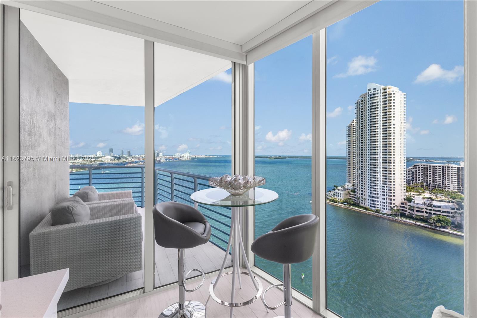 What a fun view ! Living area, primary and kitchen overlook the wide bay to the port, Miami Beach, Fisher Island and the ocean ! Beautifully designer renovated spacious 3 bedroom in One Miami right where the Miami River meets the bay. Porcelain tile floors, quality kitchen and luxurious bathrooms. The unit has good closet space and washer/dryer.
It is offered fully furnished and equipped. One Miami has stunning marble lobby with doorman, valet and an extra security gate at the driveway. It is right on the bay walk and a short walk to Wholefoods, Brickell City Centre and all that downtown Miami and Brickell has to offer. Walk 1/2 a block to Novikov, Zuma, Hell's Kitchen and more. Enjoy Bayside Park and marina, easy in and out with I95 access just blocks away.