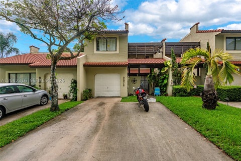 Photo of 9876 Costa Del Sol Blvd #B-93, Doral, FL 33178 (MLS # A12082316)