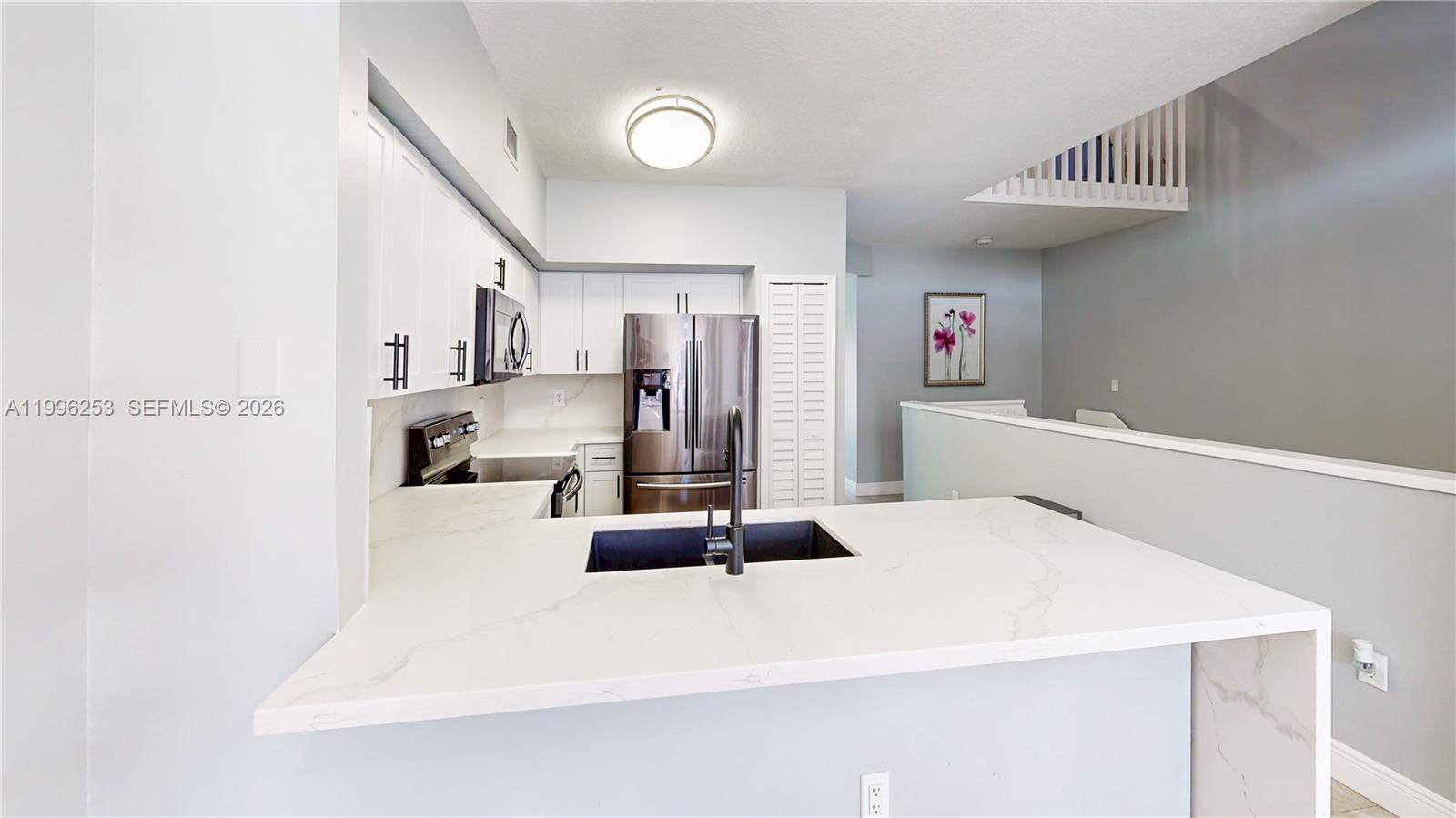 VILLAS AT THE HAMMOCKS CO - Residential