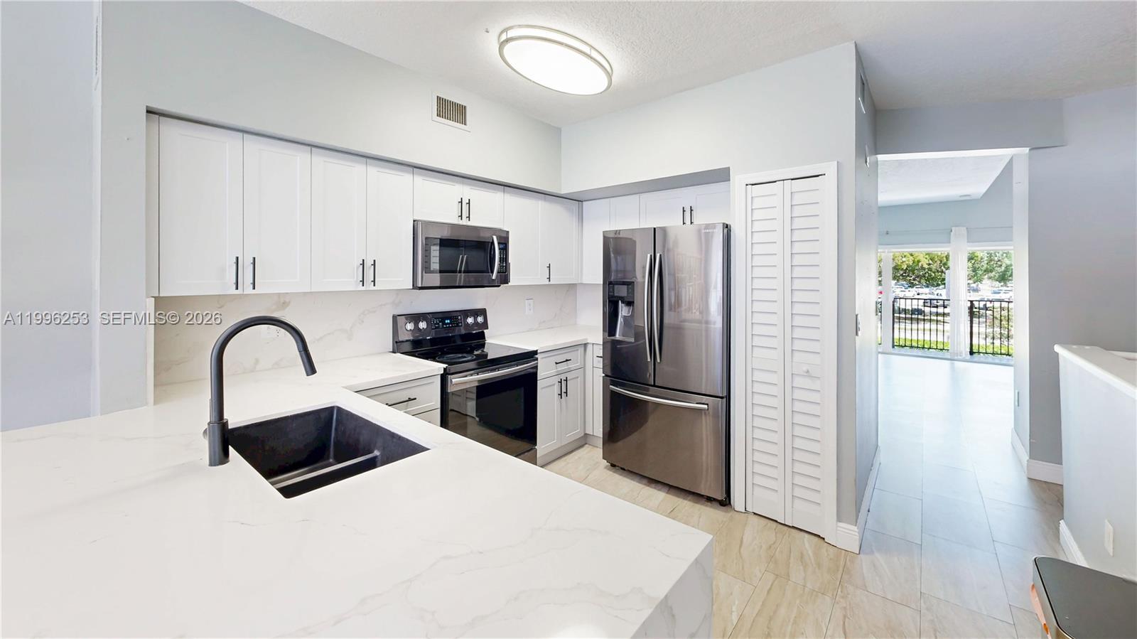 VILLAS AT THE HAMMOCKS CO - Residential