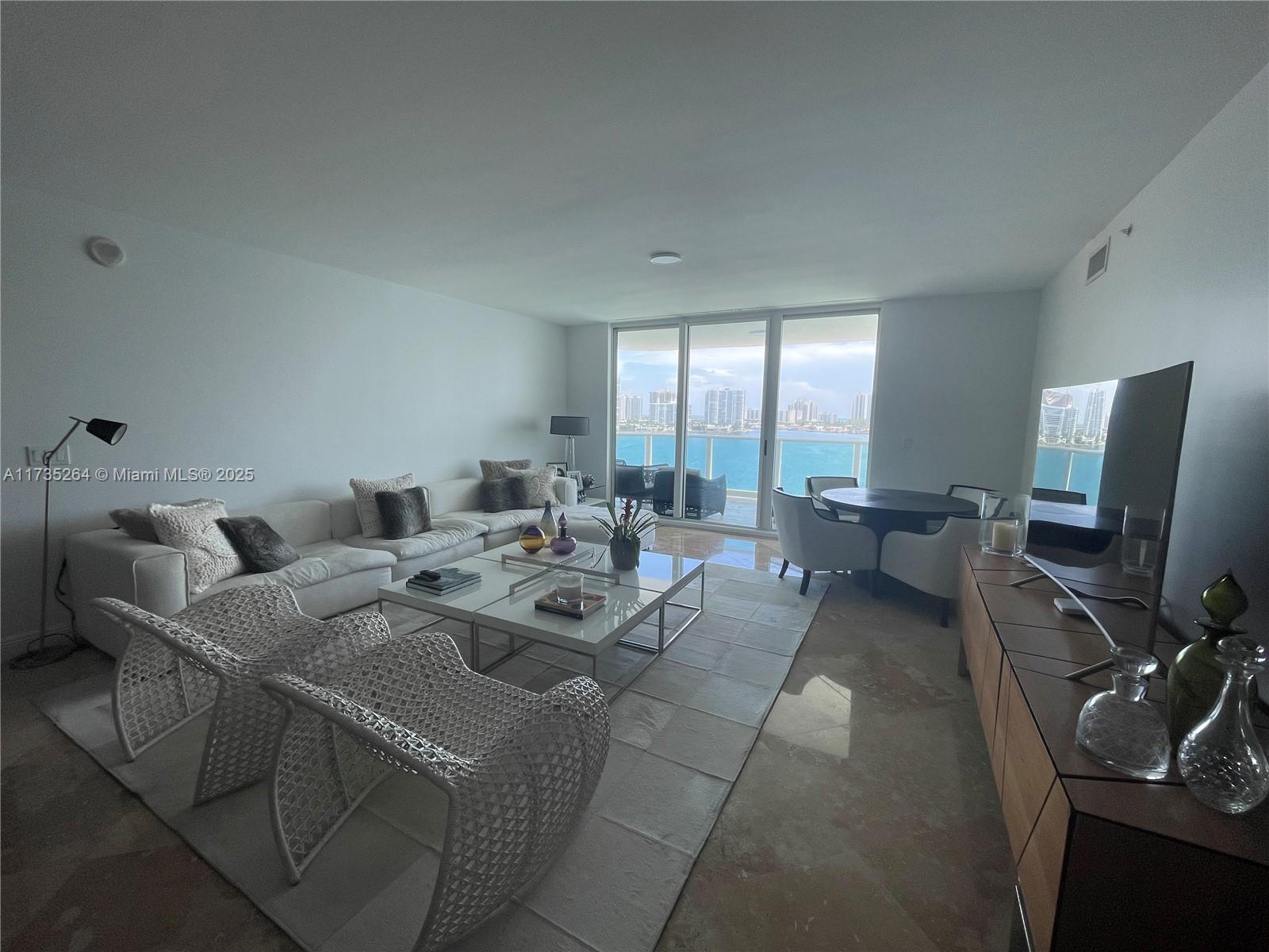 REPRICED! WELCOME TO THIS BEAUTIFUL 2 BEDROOM PLUS DEN, 2.5 BATH APARTMMENT WITH A LITTLE OVER 2,000 SQ FT OF INTERIOR SPACE. OFFERING THE PERFECT BLEND OF COMFORT AND ELEGANCE. SPACIOUS BEDROOMS, WITH A DEN THAT CAN BE CONVERTED INTO A 3RD BEDROOM. LOCATED IN ONR OF AVENTURA'S MOST DESIRED BUILDINGS. THIS RESIDENCE BOAST STUNING WATER VIEWS OF THE BAY AND OCEAN. TOP OF THE LINE APPLIANCES AND FINISHES. MINUTES TO WORLD-CLASS SHOPPING AT AVENTURA MALL, FINE DINING, ENTERTAINMENT, AND THE BEACH. EASY ACCESS TO MAJOR HIGHWAYS AND JUST A SHORT DRIVE TO SUNNY ISLES, MIAMI BEACH, AND FORT LAUDERDALE. THIS IS IS A MUST SEE APARTMENT.
VIDEO TOUR OF UNIT UPON REQUEST.