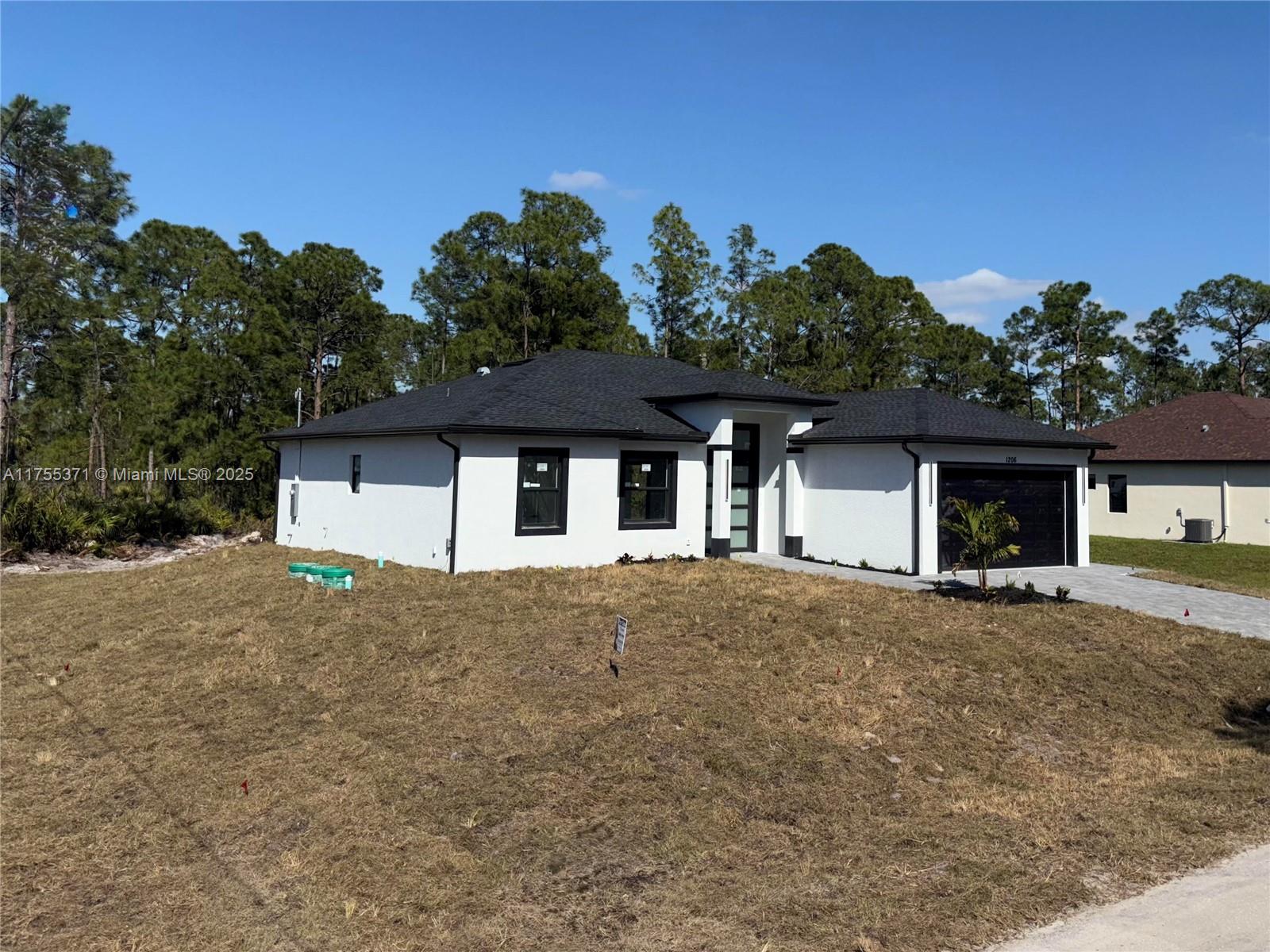 Property for Sale at 1206 W 11th St, Lehigh Acres, Lee County, Florida - Bedrooms: 3 
Bathrooms: 2  - $367,500