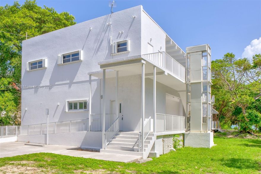 RARE 100' of waterfront re-development opportunity w/ DEEP WATER DOCKAGE APPROVED! 200' HIGHWAY FRONTAGE! Huge 74,890 SQ FT site with ACTIVE Conditional Use PERMIT for 10 unit & 4 affordable staff group home units, price. 6 TDR's available plus more. No TDR's required for pure commercial use! MIXED USE ZONING - many commercial-residential possibilities, e.g.: up to 10 market rate units, higher density w/ affordable housing, or boutique HOTEL, etc. Includes 2 story raised CBS 6,128 SQ FT building that could be used in many different ways, plus 2,340 SQ FT of outdoor porches. Near Vaca Cut for easy Ocean-Bay access, near airport, SHORT-TERM RENTALS! Contact Peter for info and tour of this amazing opportunity. THE KEYS LIFESTYLE - live, work, business, family compound - do it all right here!