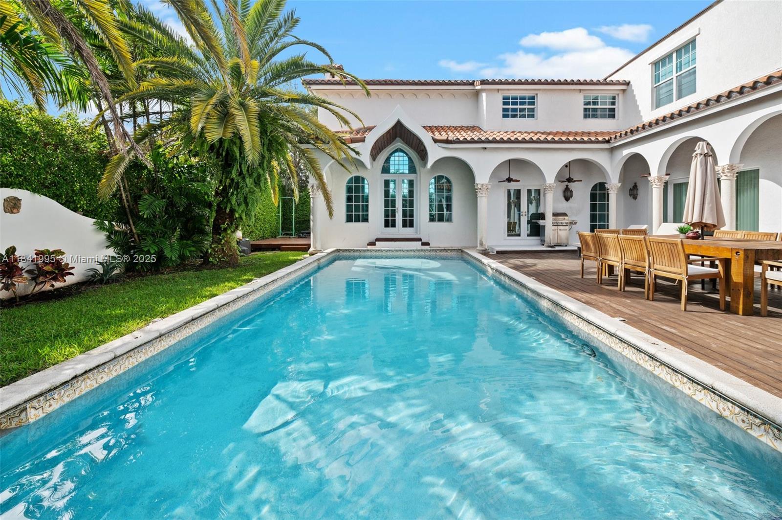 Mediterranean Mansion with 7 bedrooms and 7 bathrooms, 3 living rooms, and a large kitchen. Located in Miami Beach's best location. A quiet, safe neighborhood minutes away from the beach, golf, clubs, the most exclusive hotels and Lincoln Road. The home features Moroccan fixtures and furniture, the living/dining area has amazing high ceilings, as does the upstairs master bedroom, which also has spacious walk in closet and master bath. Lounge or entertain in the privacy of your own pool and garden and enjoy the sea breeze from the roof terrace, with sun exposure all day.