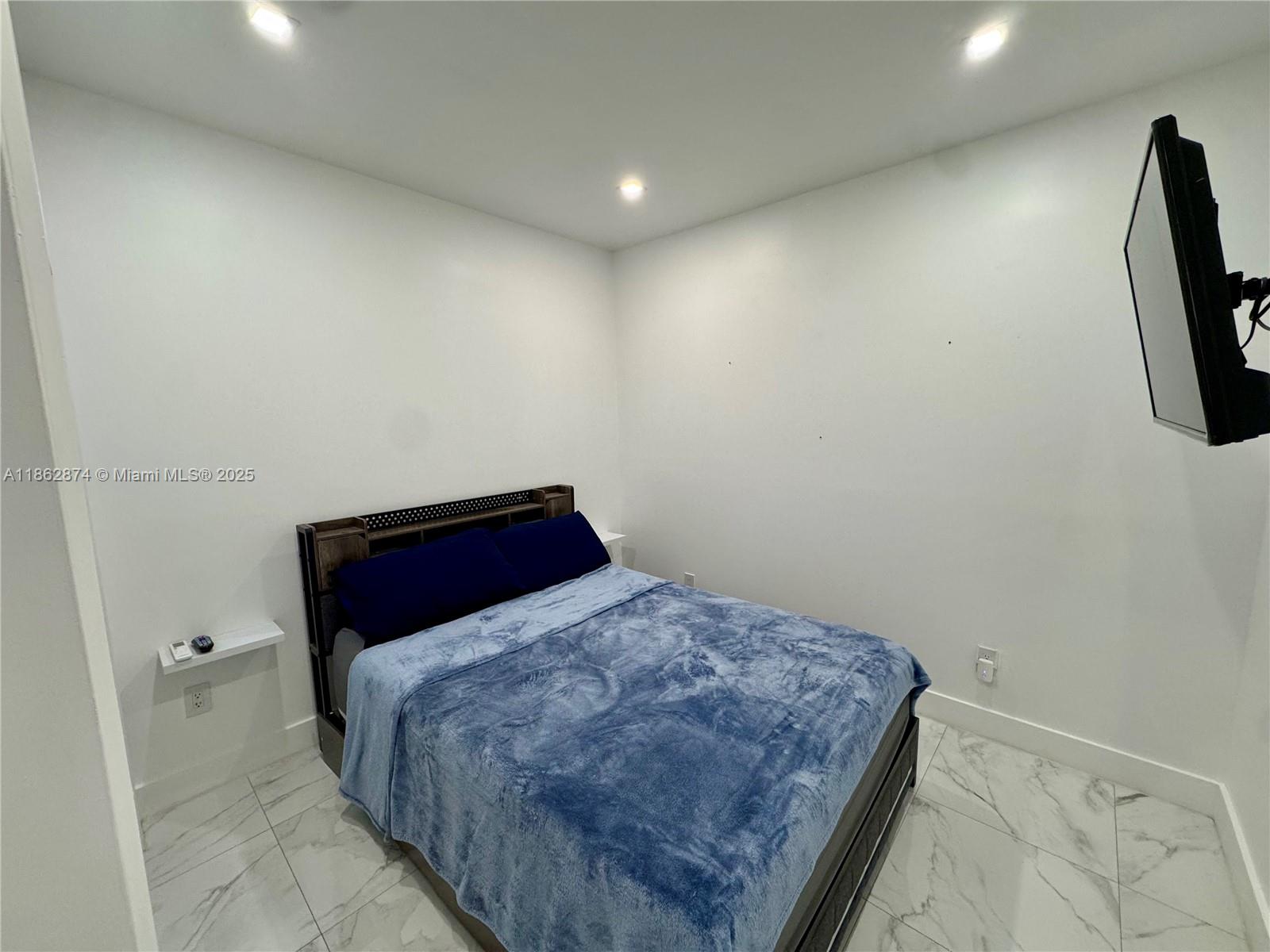 Available September 1st, this well-maintained efficiency is ideal for one tenant only and features its own private entrance. The unit includes a full kitchenette with induction cooktop, air fryer, and microwave, along with a washer and dryer for added convenience. Utilities are included in the rent, and the space is offered unfurnished, allowing you to make it your own. No dogs are allowed. Move-in requires first month’s rent and one month security deposit with good credit.