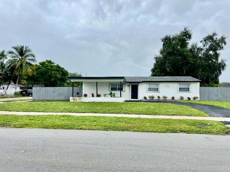 Prime Miami Gardens location with a brand-new roof! This single-family home features a stylish designer kitchen and bathrooms, offering 4 bedrooms and 2 bathrooms, with potential for rental income or an in-law suite. It boasts a spacious living area on a 7,875-square-foot lot, with tile and laminate flooring throughout, roomy interiors, walk-in closets, a large family room, and a carport. The freshly painted interior adds a modern touch, while complete accordion shutters provide security and storm protection. With a generous laundry room and a fenced yard, this property is move-in ready!