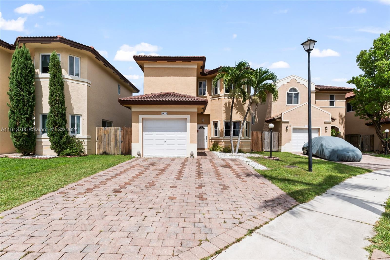 Lovely 3 bedroom, 2.5 bath, single family home. Located in the highly desirable Waterstone Gated Community. This two story home has plenty to offer. From the natural light flowing in through the French doors, to the screened patio facing the lake. Enjoy entertaining in the backyard, with a view! Canister and banana tree stay. New AC installed 2021. The kitchen has new stainless steel appliances, new sink hardware, tasteful backsplash and custom shelves for additional storage. Laminate floors on 1st & 2nd floor, real wood staircase! Florida living at it’s finest, a water view from your main bedroom and Large walk-in closet. Centrally located from shopping centers; Publix, Walmart, and Starbucks. Easy access to the Turnpike. Less than 10 min from Homestead AFB. Community pool and play area.