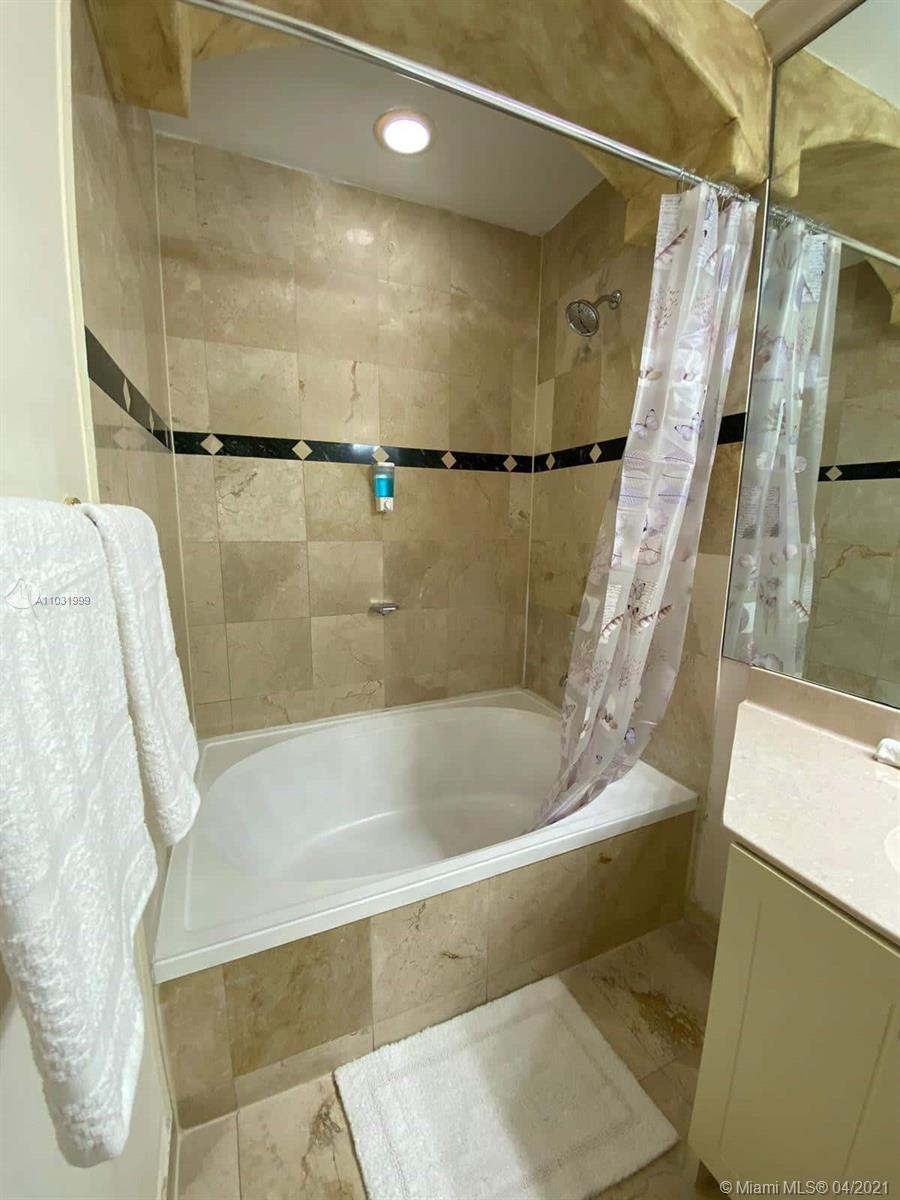 SECRET GARDEN CONDO - Residential Lease