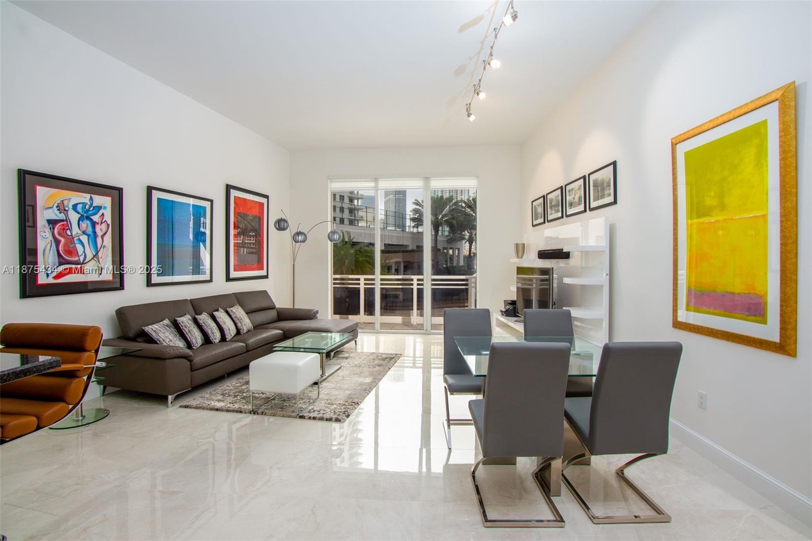 Spectacular Fully Furnished Residence at Carbonell. Discover this one-of-a-kind residence in the prestigious Carbonell, featuring soaring extra-high ceilings and breathtaking views of the Miami skyline. Located in the most sought-after 09 line, this exquisitely decorated unit is move-in ready and sure to impress. The master bedroom offers direct access to the balcony, while floor-to-ceiling glass throughout fills the space with natural light. Elegant hard flooring and top-quality finishes add to the refined design. The unit includes one assigned parking space, with the option to rent an additional space for $150 per monthImmediate occupancy available. Showings by appointment only.
