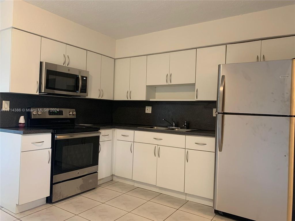 Photo of 5920 NW 19th St #A, Sunrise, FL 33313 (MLS # A11714386)