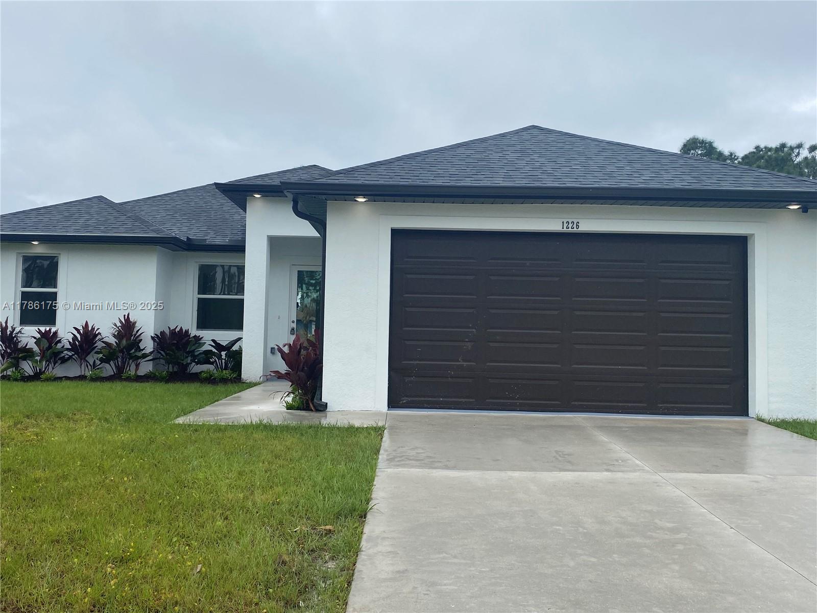1226 Nimitz Blvd, Lehigh Acres, Lee County, Florida - 3 Bedrooms  
2 Bathrooms - 