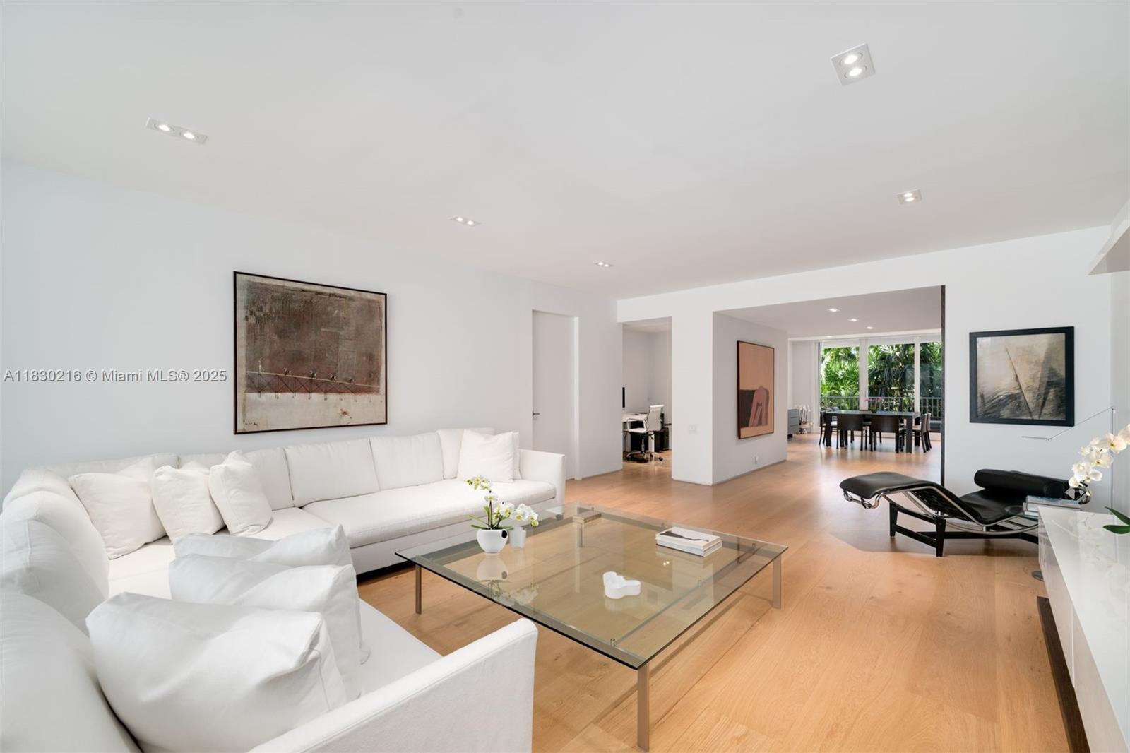 Exquisitely remodeled and impeccably designed, this spacious 2-bedroom, 2.5-bath residence with a flexible office/den boasts 2,100 square feet of refined living space under A/C. The desirable flow-through layout ensures excellent cross-ventilation and features two oversized balconies that seamlessly blend indoor and outdoor living. Interior highlights include rich wood flooring, sleek frameless doors, custom cabinetry, and premium appliances that reflect modern sophistication.
Enjoy serene, lush garden views that provide both privacy and tranquility. Ideally situated in a premier resort-style community just steps from the beach, pools, tennis and paddle courts, restaurants, spa, and an array of world-class amenities designed for relaxed island living.
