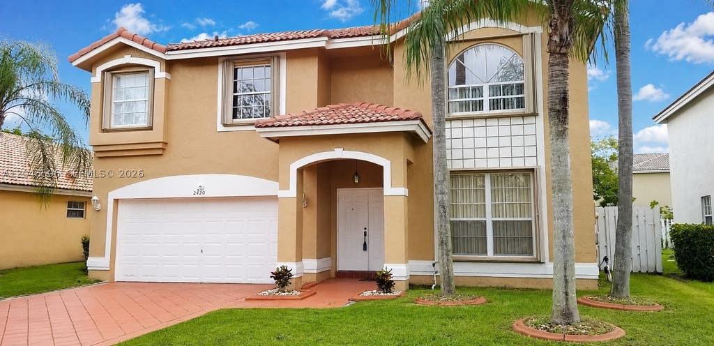 Photo of 2420 NW 137th Ter #2420, Sunrise, FL 33323 (MLS # A12048596)
