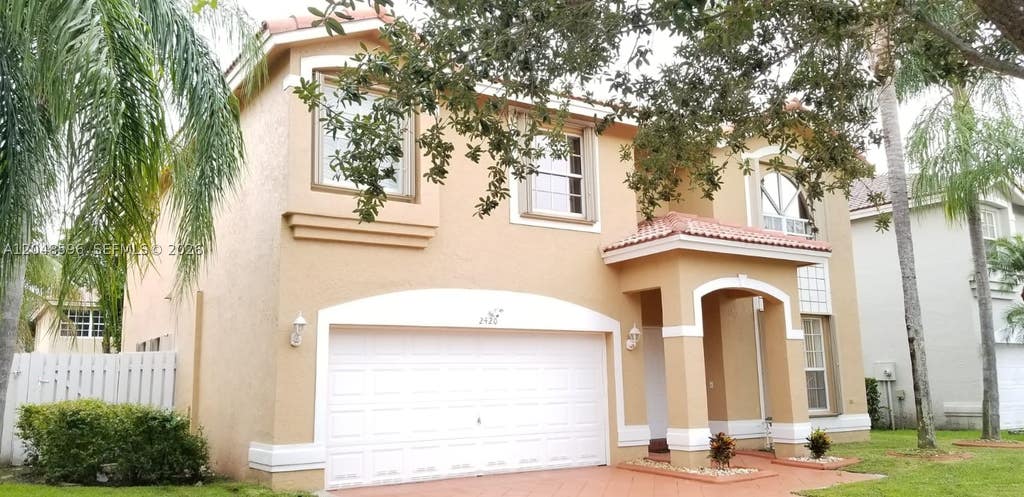 Photo of 2420 NW 137th Ter #2420, Sunrise, FL 33323 (MLS # A12048596)
