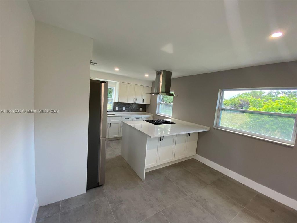 Photo of 3204 Anderson Dr, Fort Pierce, FL 34946 (MLS # A11611536)