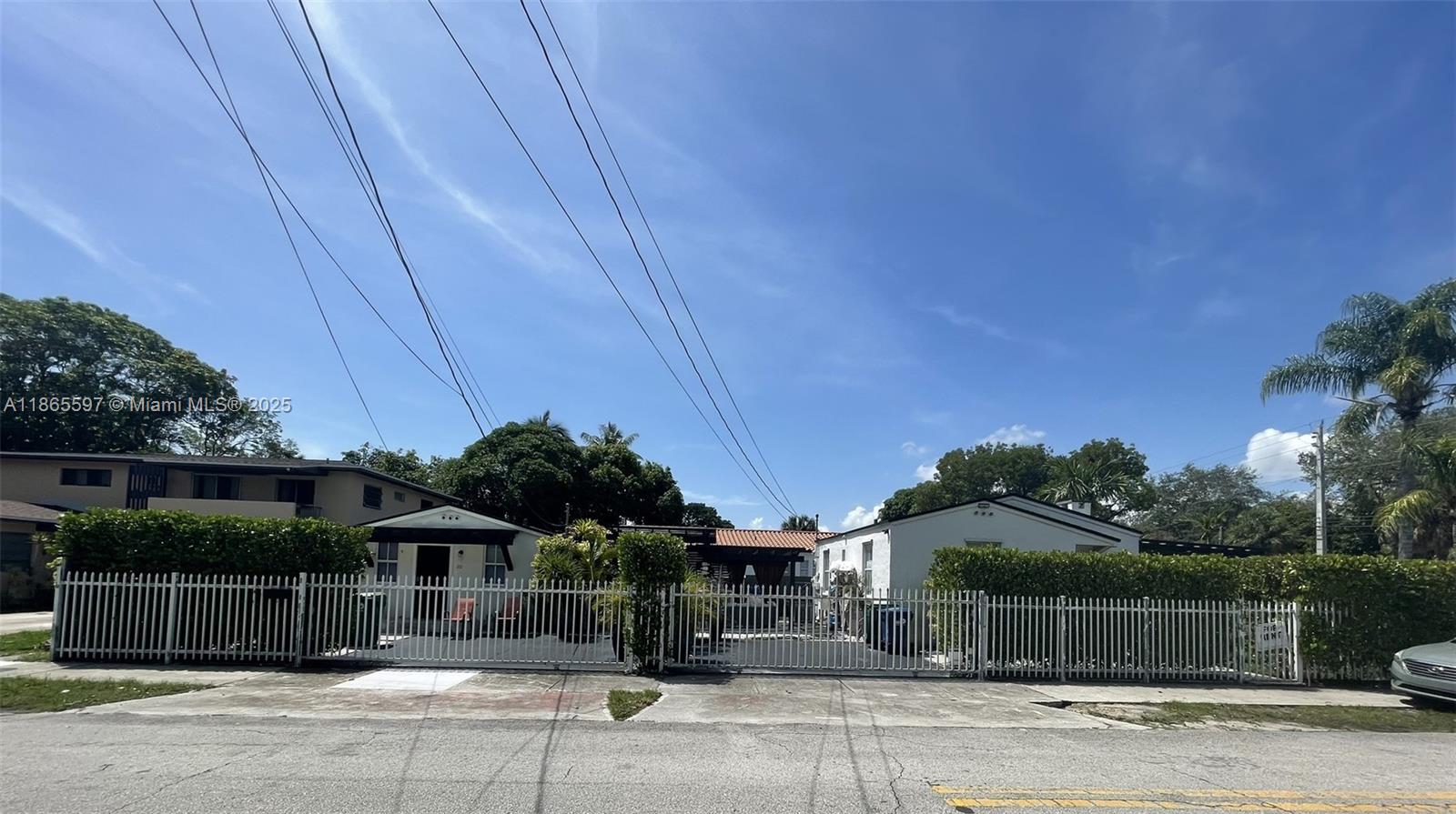 Miami Shores Gem! Spacious 3BR/2BA duplex offered as one home with the feel of two single-family residences. Elegant porcelain & wood floors, updated kitchens, central A/C, and washer/dryer. Outdoor living at its best with two pergolas, gated driveway, and fenced yard. Prime location steps to Barry University, minutes to Biscayne Blvd, Wynwood, Design District, Midtown, and the beaches. A rare find combining space, style, and unbeatable convenience!
