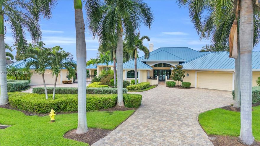 Welcome to your dream luxury retreat in North Fort Myers, FL Direct Gulf Access Pool Home With 4894 sqft. 5 Beds + Office, 4 baths 1/2 & 10 Car Garage. Step inside to discover a chef's kitchen that is both stunning and functional, featuring a long island with a pristine quartz countertop, custom cabinetry, and top-of-the-line stainless steel appliances, including a gas stove. The space is framed by soaring coffered ceilings, enhancing the sense of grandeur, while the engineered hardwood floors. Each spacious bedroom offers direct access to a private courtyard, providing a serene escape from the world. Beyond the home, a sailboat access canal leads directly to the river, just three minutes away. The private dock and boat lift make it easy to embark on your nautical adventures.