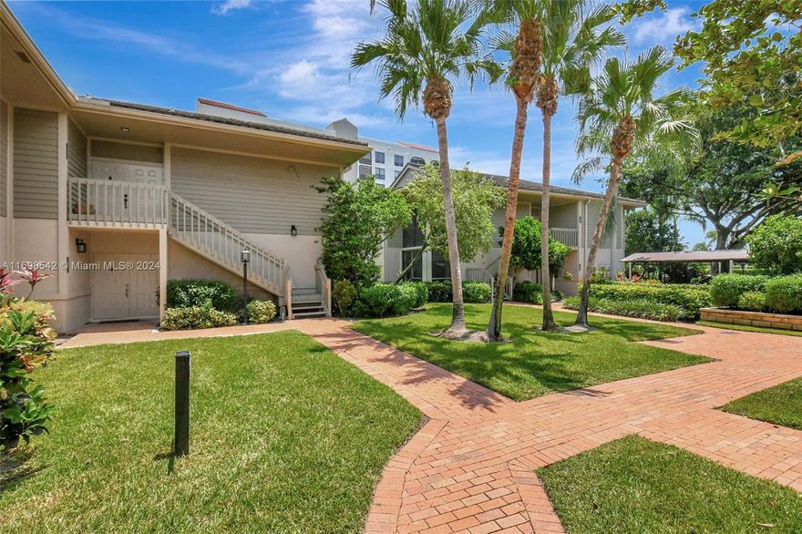 Welcome to South Florida Living! This 2 bedroom/2 bath with a den/office is the perfect full time home or vacation get away. Fully open concept kitchen and living area with wrap-around balcony that provides privacy and a beautiful golf course view. The very large primary suite has room for a sitting area, The stylish en-suite primary bath has a separate tub and shower and dual vanities. Custom walk-in and standard closets will suit all your needs. Guest bedroom has room for a queen bed and large closet. There is also a den/office with a door for privacy and access to the screened balcony. Screened balcony features new tile.  There is a community pool and spa. The Club at Boca Pointe is not mandatory to join and offers many membership options, including a part-time membership.