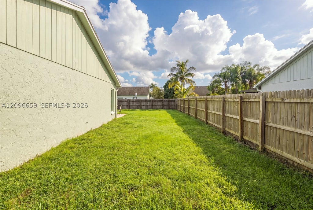 Photo of 1290 Mc Dermott Ln, Royal Palm Beach, FL 33411 (MLS # A12096659)