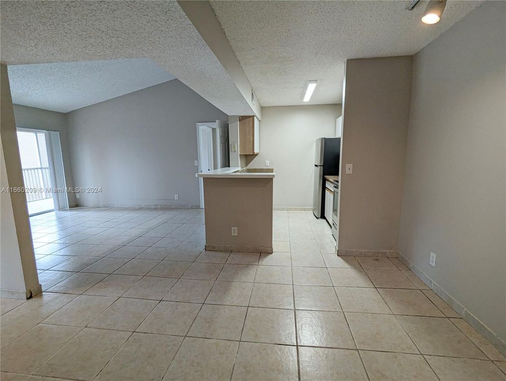 Photo of 4015 W Mcnab Rd #D308, Pompano Beach, FL 33069 (MLS # A11660209)