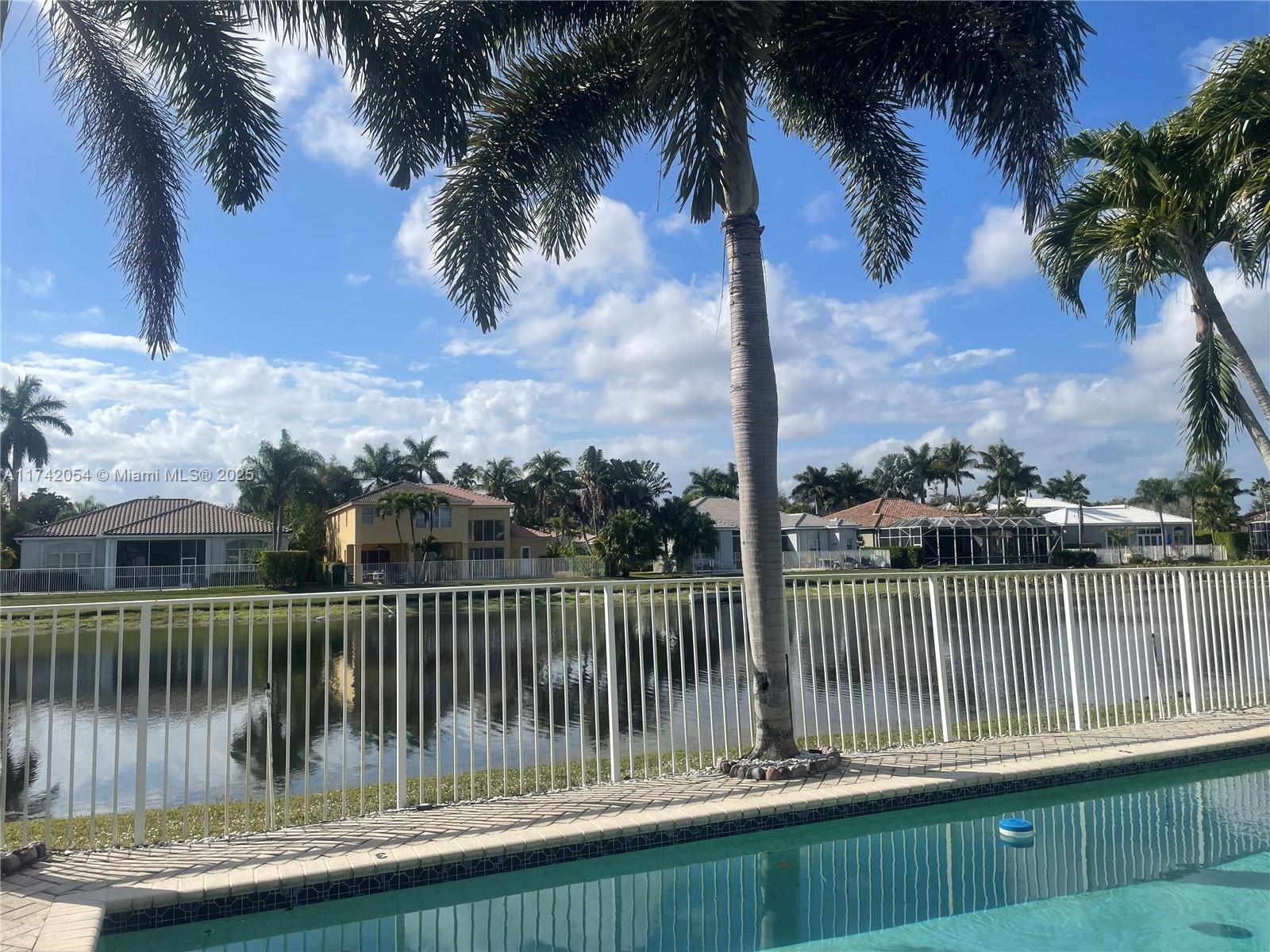BEAUTIFUL HOME SITTING ON THE LAKE IN QUIET GATED COMMUNITY THE SHORES
SPECIAL INTERIOR FEATURES LOVELY 4 BEDROOMS 3.5 BATH , SPLIT FLOOR PLAN WITH SEPARATE MASTER BEDROOM,SCREENED SIDE PATIO WHERE YOU CAN ENJOY BEAUTIFUL SUNSET WILE DINING OUTSIDE WITH THE VIEWS OF THE POOL AND THE LAKE
HIGH CEILINGS KITCHEN AND LIVING ROOM AREA WITH BUILD IN OVEN AND BREAKFAST AREA
HOME HAS 2 AC UNITS,2WALK IN CLOSETS IN MASTER BEDROOM,JACUZZI,WASHER/DRYER, 3 CAR GARAGE
THE LANDLORD IS CURRENTLY IN THE PROCESS UPDATING KITCHEN APPLIANCES AND TILING BEDROOMS
SHORES COMMUNITY OFFERS 4TENNIS COURTS,COMMUNITY POOL,CLUBHOUSE,PLAYGROUND,
LOCATED ACROSS SOUTH COUNTY REGIONAL PARK AND A-RATED SCHOOLS