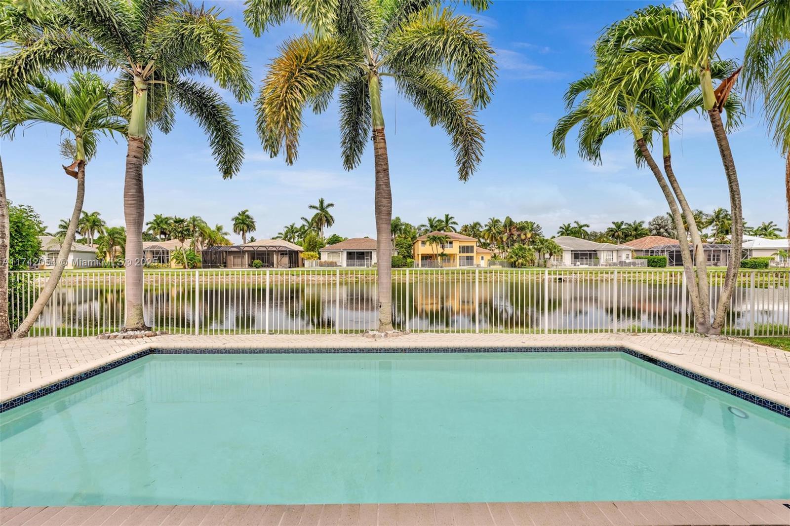 BEAUTIFUL HOME SITTING ON THE LAKE IN QUIET GATED COMMUNITY THE SHORES
SPECIAL INTERIOR FEATURES LOVELY 4 BEDROOMS 3.5 BATH , SPLIT FLOOR PLAN WITH SEPARATE MASTER BEDROOM,SCREENED SIDE PATIO WHERE YOU CAN ENJOY BEAUTIFUL SUNSET WILE DINING OUTSIDE WITH THE VIEWS OF THE POOL AND THE LAKE
HIGH CEILINGS KITCHEN AND LIVING ROOM AREA WITH BUILD IN OVEN AND BREAKFAST AREA
HOME HAS 2 AC UNITS,2WALK IN CLOSETS IN MASTER BEDROOM,JACUZZI,WASHER/DRYER, 3 CAR GARAGE
THE KITCHEN WAS RECENTLY UPDATED WITH NEW APPLIANCES,THE BEDROOMS HAVE NEW TITLES
SHORES COMMUNITY OFFERS 4TENNIS COURTS,COMMUNITY POOL,CLUBHOUSE,PLAYGROUND,
LOCATED ACROSS SOUTH COUNTY REGIONAL PARK AND A-RATED SCHOOLS