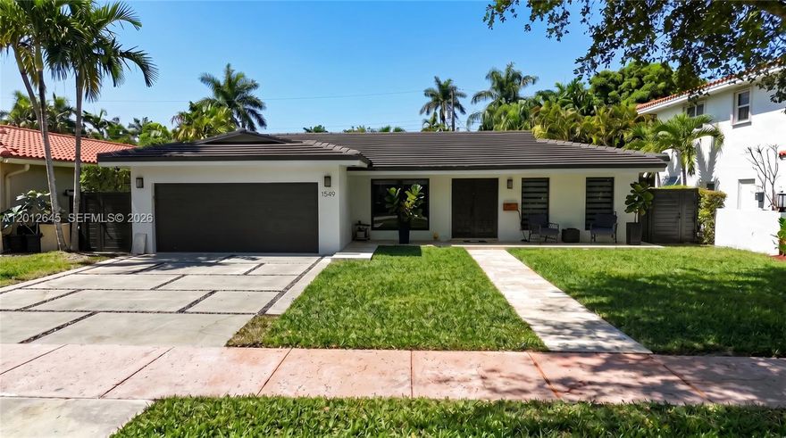 An exceptional opportunity in the heart of Coral Gables. This fully renovated, turnkey 4-bedroom, 2-bathroom residence has been meticulously upgraded with a new roof, new AC, and premium finishes throughout. Designed for effortless living and entertaining, the home boasts a generous lawn and a private patio — your own outdoor retreat in the South Florida sunshine. Nestled on a quiet, closed street offering rare privacy, yet moments away from the University of Miami, world-class dining, boutique shopping, grocery stores, and vibrant entertainment. A true move-in ready gem in one of Miami's most coveted zip codes.