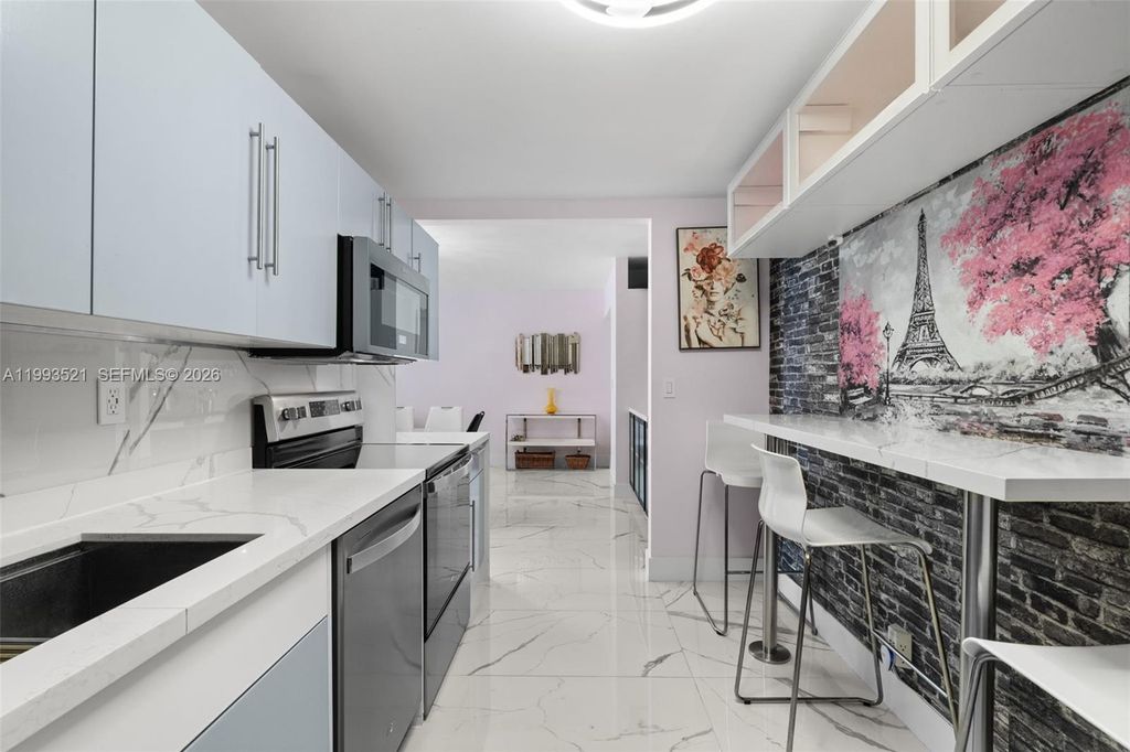 Photo of 3000 S Ocean Dr #606, Hollywood, FL 33019 (MLS # A11993521)