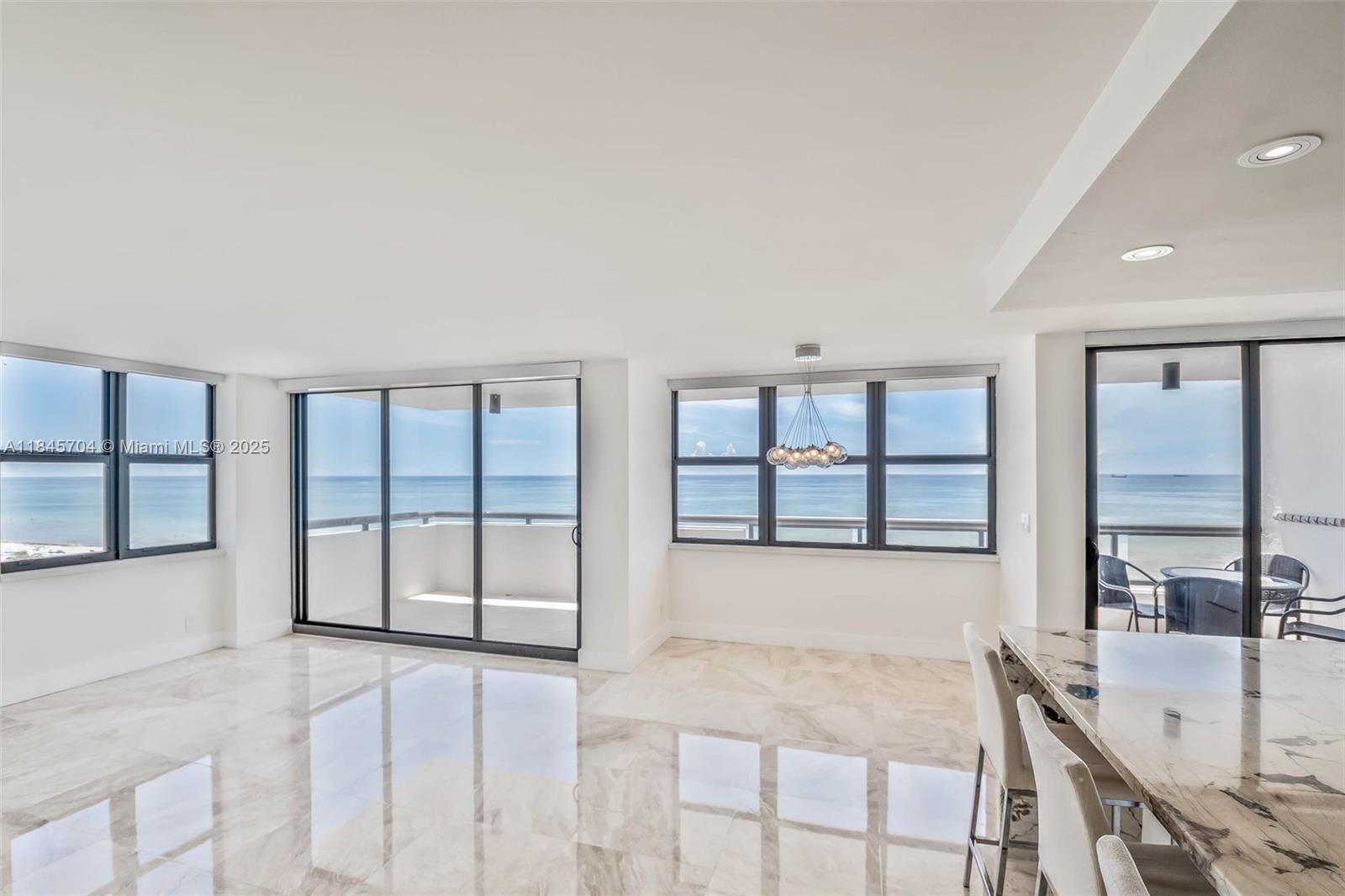 Direct ocean, corner unit, fully renovated in Club Atlantis, South Beach. Unobstructed breathtaking views from inside and out. Professionally designed with high end finishes. Automatic electric window treatments, Stone countertops, Viking & Bosch appliances, Waterfall Island to enhance your kitchen with lots of custom designed cabinets. High impact windows. The second bedroom includes a Murphy bed, ideal for flexible use as an office or guest room. Club Atlantis provides fitness room, community room, heated pool, convenience store, 24 hour security, attended lobby. Minutes to shopping, cafes, restaurants, museum, ballet & entertainment. Directly on the beach. Available for 1 year, can be furnished or unfurnished.