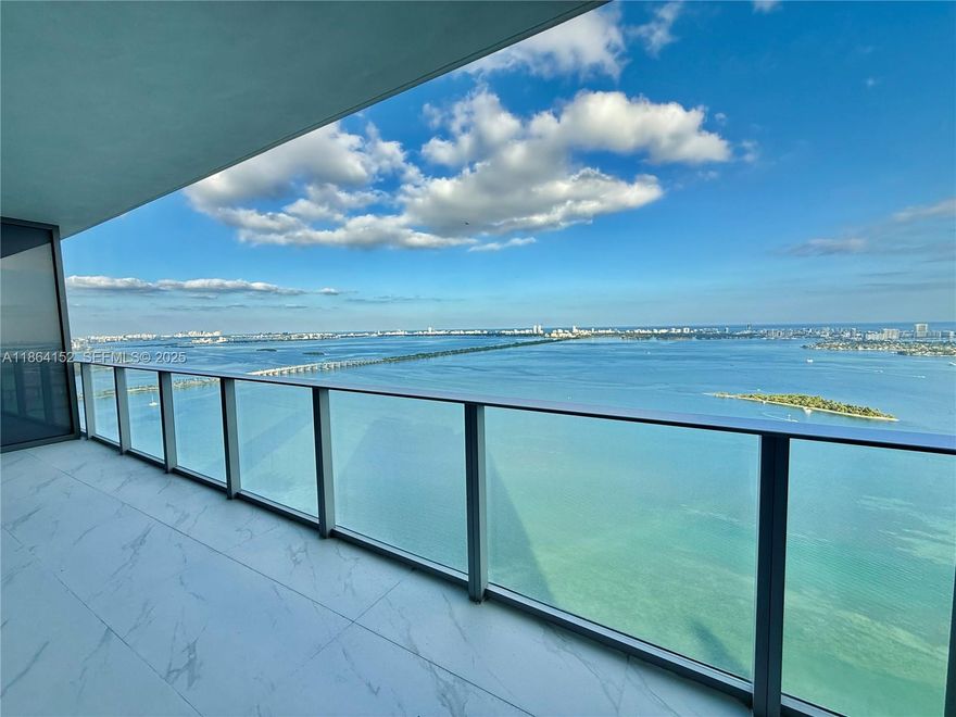 Spectacular, 80k plus in upgrades. brand-new residence at Aria Reserve Miami, the newest architectural icon on Biscayne Bay. This unit offers 3 spacious bedrooms, 3 full bathrooms, a versatile den (perfect for a home office or media room), and a breathtaking 180-degree panoramic view of the bay. Enjoy 2 assigned parking spaces and an exceptional array of resort-style amenities, including: • Bayfront pools and sundecks • Full-service fitness center, Spa, steam room, and wellness areas • Tennis and basketball courts • Private marina with water access • Lounge areas, social club, and coworking spaces Located in the heart of Edgewater, just minutes from Wynwood, the Design District, Downtown, and Miami Beach. Luxury, comfort, and unparalleled views — this is Miami living at its finest.