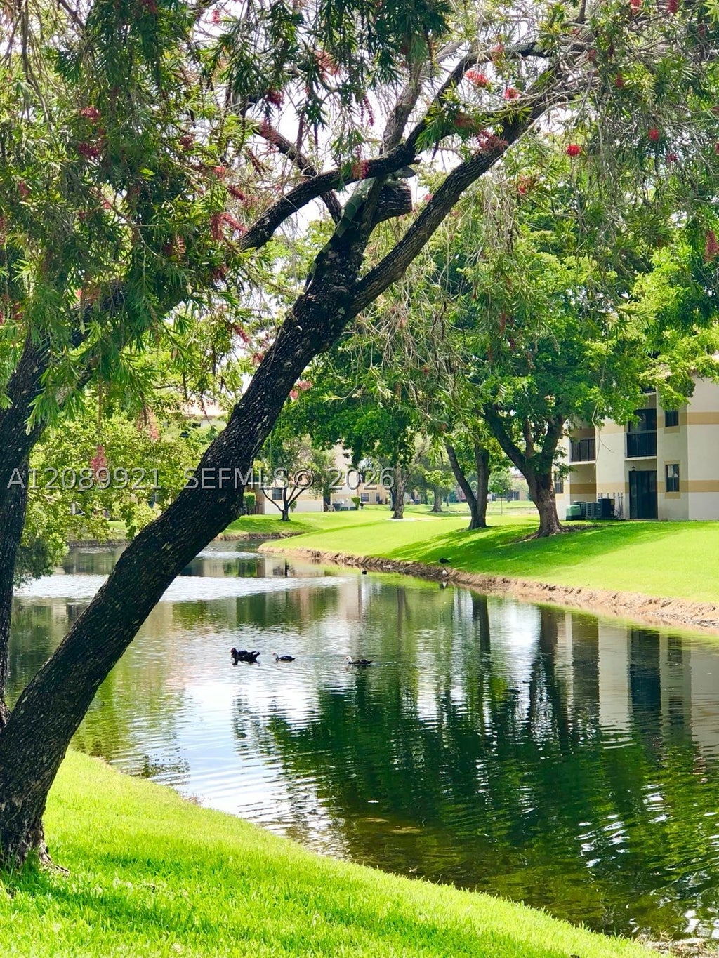 Photo of 9897 Nob Hill Ln #9897, Sunrise, FL 33351 (MLS # A12089921)
