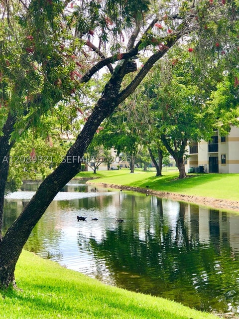 Photo of 9897 Nob Hill Ln #9897, Sunrise, FL 33351 (MLS # A12089921)