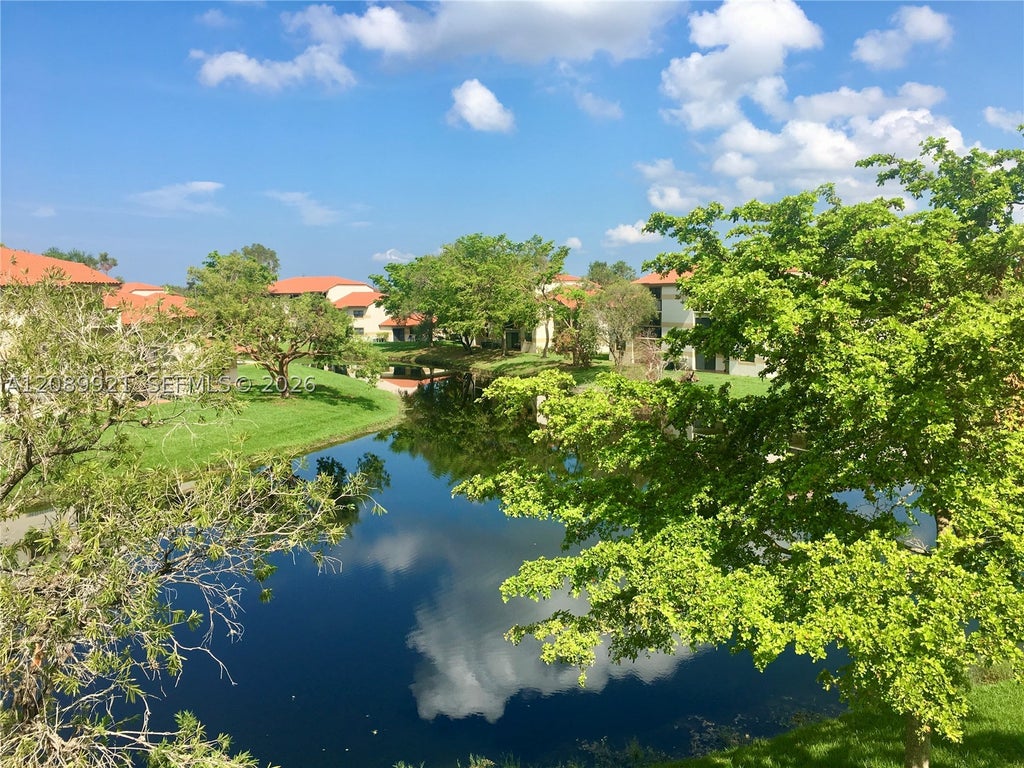 Photo of 9897 Nob Hill Ln #9897, Sunrise, FL 33351 (MLS # A12089921)