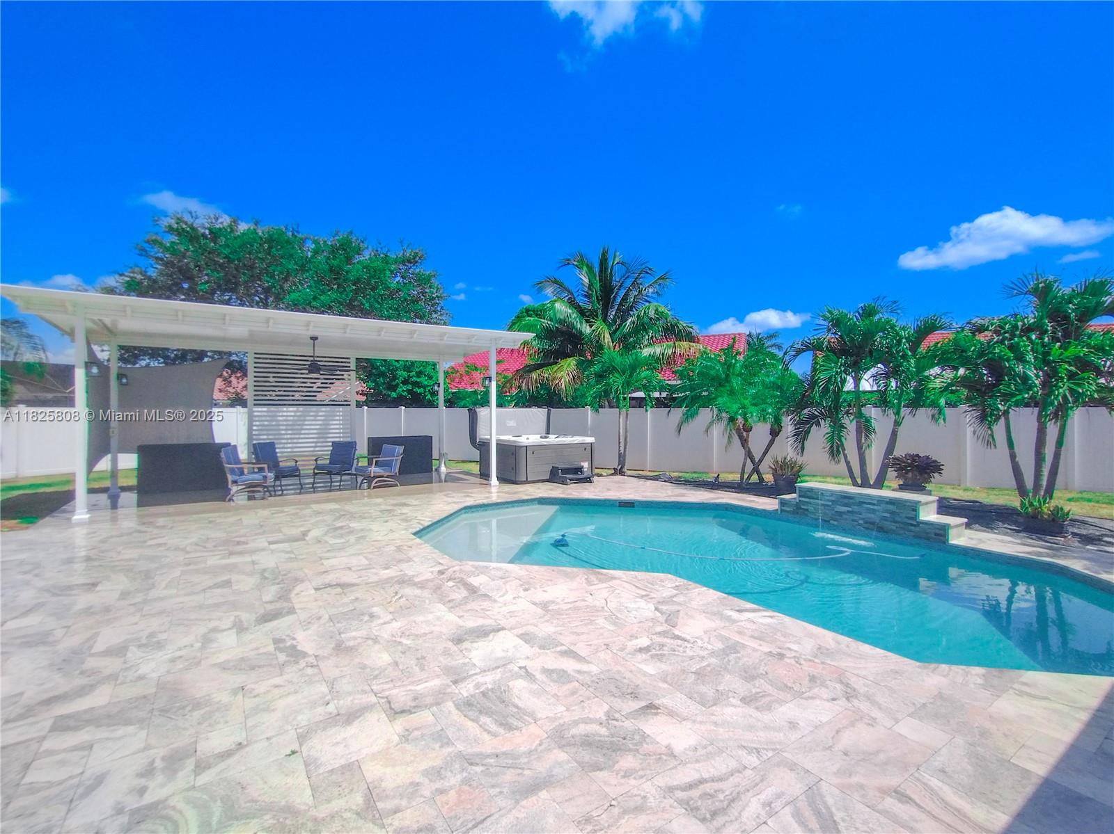 Discover your dream home! This split-design house sits on a generous 1/4 acre lot, features a luxury pool, terrace, and spa for enjoyment. Vaulted ceilings throughout the open floor plan create a sense of spaciousness, enhanced by the open porch. Relax by the fireplace in the living room's built-in entertainment center. Formal dining room provides lovely views of the pool. The chef's kitchen is complete with a island. The master suite features a California-style walk-in closet for ultimate organization, a double vanity, and a glass/rain shower. Guests can be accommodated in a flexible room perfect as an office or bedroom. Other bedrooms have ample space and walk-in closets while the guest bathroom features a charming cabin design, a double quartz vanity, and a glass/rain shower.