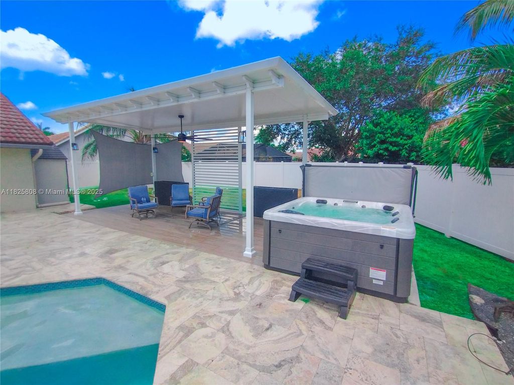 Photo of 5780 Sun Pointe Circle, Boynton Beach, FL 33437 (MLS # A11825808)