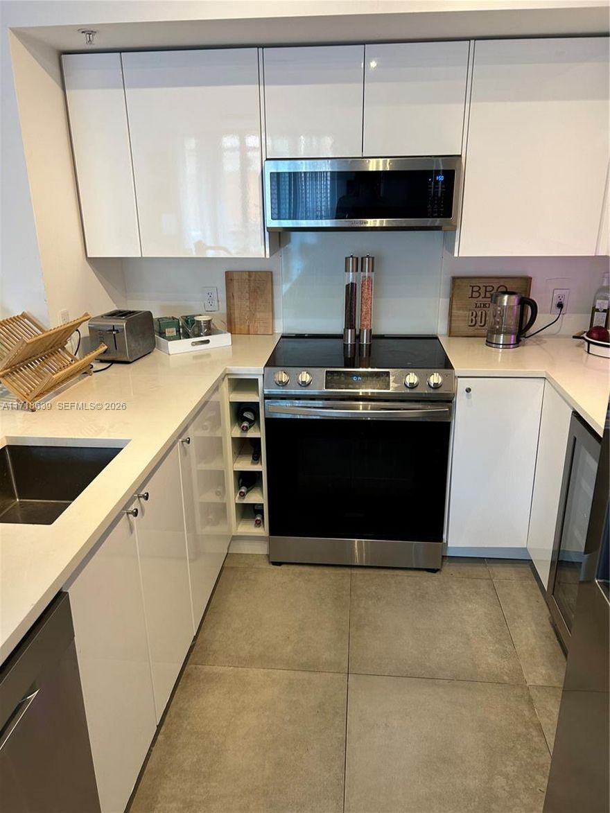 Totally renovated to the highest quality in 2022/23; fully Permitted by Miami Beach Building Department;  new electrics; new plumbing; new kitchen with Samsung s/s appliances  fridge/freezer; dishwasher; oven/hob; microwave; wine cooler; white quartz surfaces; 2 new bathrooms with German sanitary ware, Grohe and Duravit; Porcelanosa ceramic tiling; Somfy electric window blinds; new impact windows and doors 2024; BIG BALCONY; new Bosch a/c 2024; large designer closets; LED lighting; Samsung separate washer and dryer; designated car parking on Level 3 so no waits for the elevator! Totally turn-key.