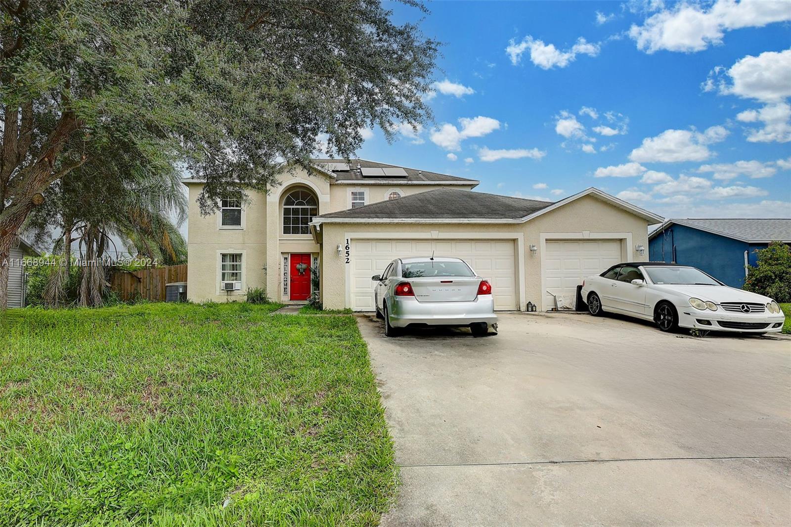 Great Home in sort after Port St Lucie with 4 bedrooms and 2/1/2 bathrooms and 3 car garage, formal living and dining room, updated cabinets and a large island kitchen with two pantries and eat in area, large family room for entertainment. The master suite has garden tub & shower, 2 walking closets. Nice laundry room area inside the house, newer solar panels for your convenience, and a huge patio that can fit a pool. Centrally located, and easy access to I-95 and Turnpike. Owner relocating and offering 10,000 for closing cost.