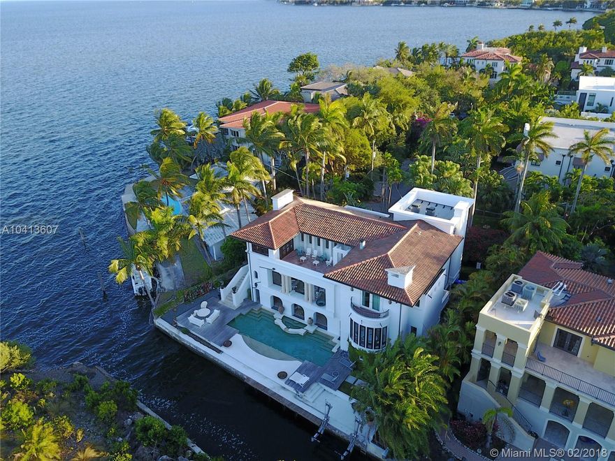 PRICED TO SELL: A renowned Jorge Hernandez Estate. Renovated in 2013. 3-story home, Unobstructed views, sitting directly in front of Biscayne Bay over-looking towards downtown Miami's City Skyline-- An absolute spectacle during day AND in evenings. This home sits in a private gated community, towards the corner of a cul-de-sac, in prestigious Coconut Grove. Home features expansive Terraces--great for entertaining guests, a double height living room, New Top-of-the-line Appliances, New A.C units, Elevator, Gym, Entertainment Room, Maid's Quarter, New Boatlift, Calacatta Marble floors,  New Hurricane Impact Windows & Doors, New Pool Re-Surface & Equipment, 4 Fireplaces, 3 car garage, W/ plenty of storage!