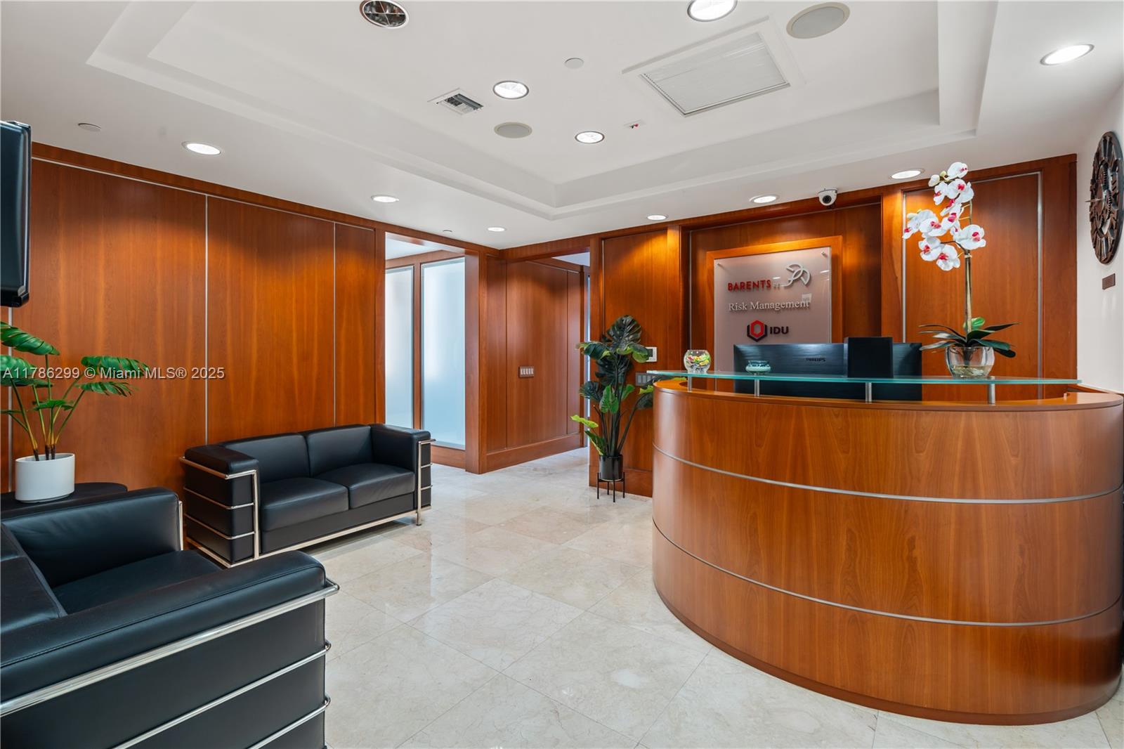 An impressive 2,501 square foot office in one of Brickell’s most renowned Class A office towers. This suite is ideally located directly on Brickell Avenue, providing excellent visibility, elegant finishes, and a layout that enhances productivity and prestige.
The office condo features three executive offices, three junior offices, two conference rooms, and three open workstation areas, each accommodating multiple desks. The office condo also features a spacious reception area, a welcoming lobby, and an oversized kitchenette, all designed to create a comfortable environment for staff and clients.
Interior enhancements feature marble flooring, custom fine-wood wall paneling, built-in elements, and floor-to-ceiling windows.