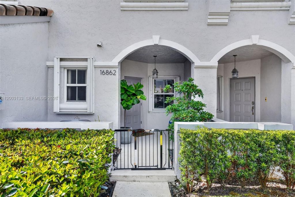 Photo of 16862 SW 1st St, Pembroke Pines, FL 33027 (MLS # A12003133)