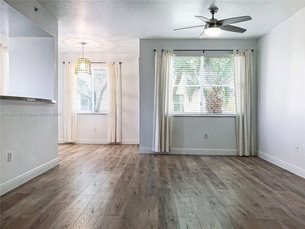 Photo of 11018 Legacy Dr #204, Palm Beach Gardens, FL 33410 (MLS # A11343496)